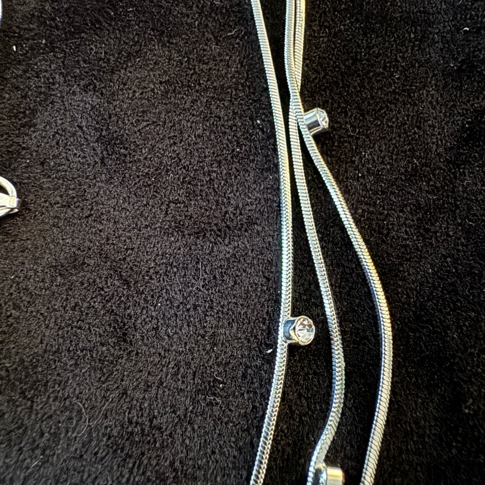 Nicole Miller Long Silver 3 strands Necklace. - Picture 2 of 3